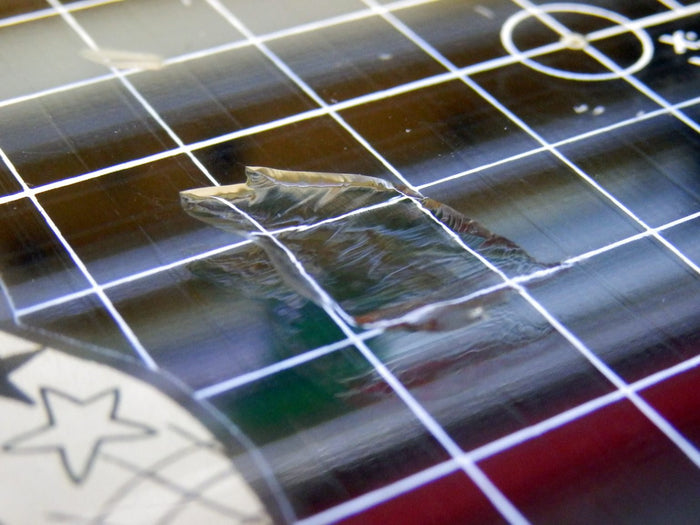 Chipped Glass build-plates - What causes it?